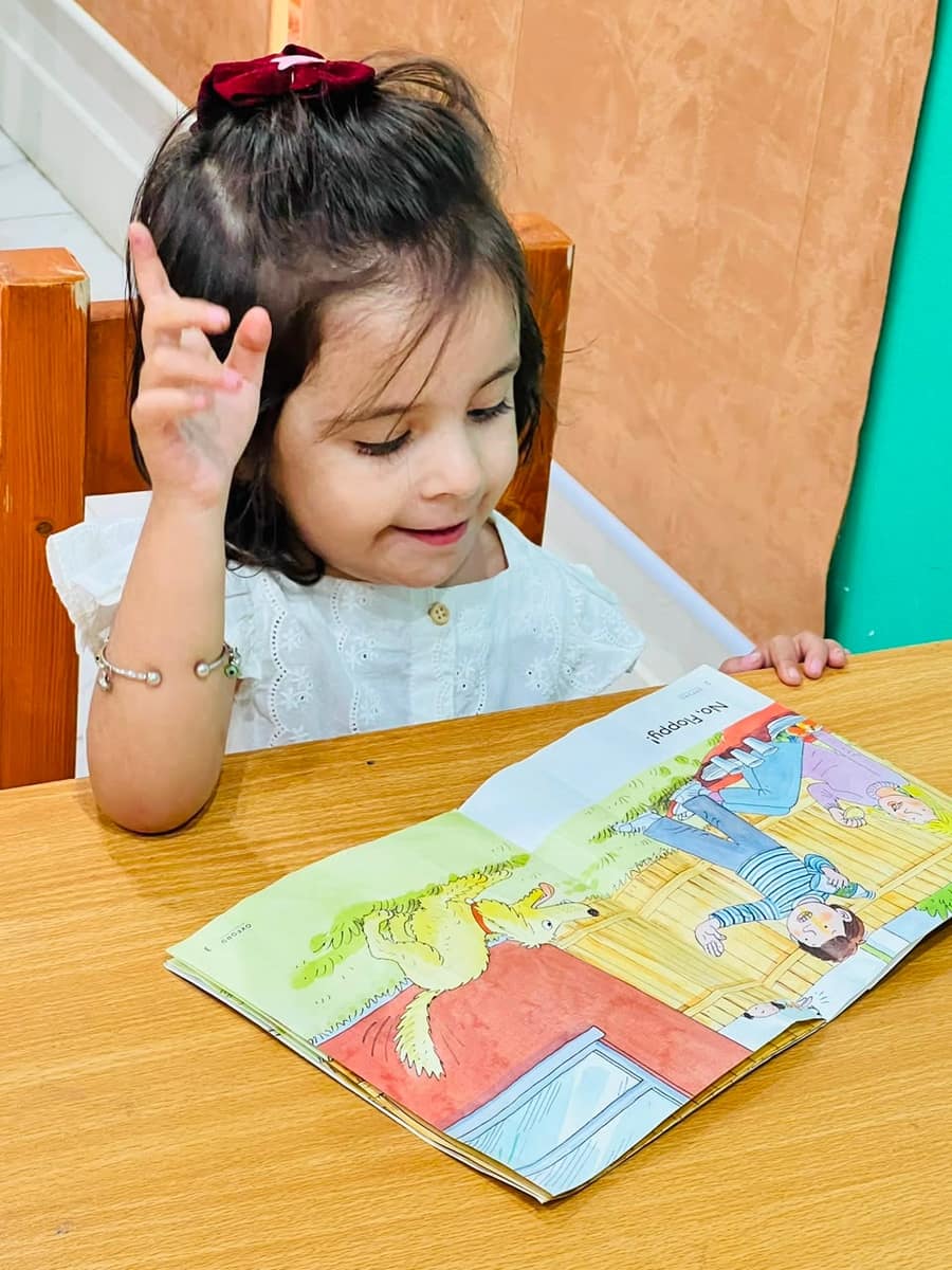 Child enjoying a hands-on art activity at NEST therapy center, DHA Phase 2, Islamabad